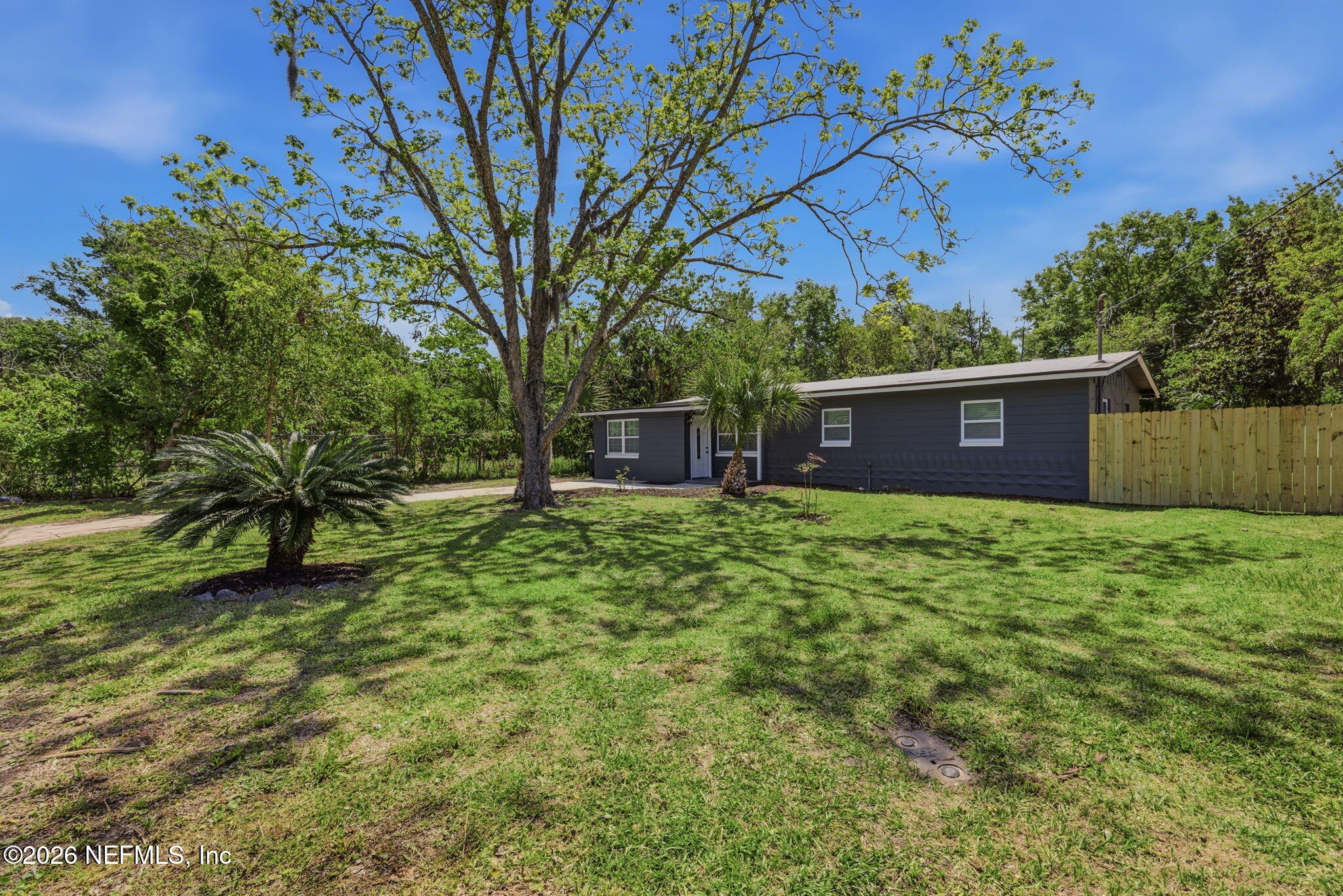 10184 Herndon Road Jacksonville, FL 32246 - Photo 24 of 28 a view of house with backyard