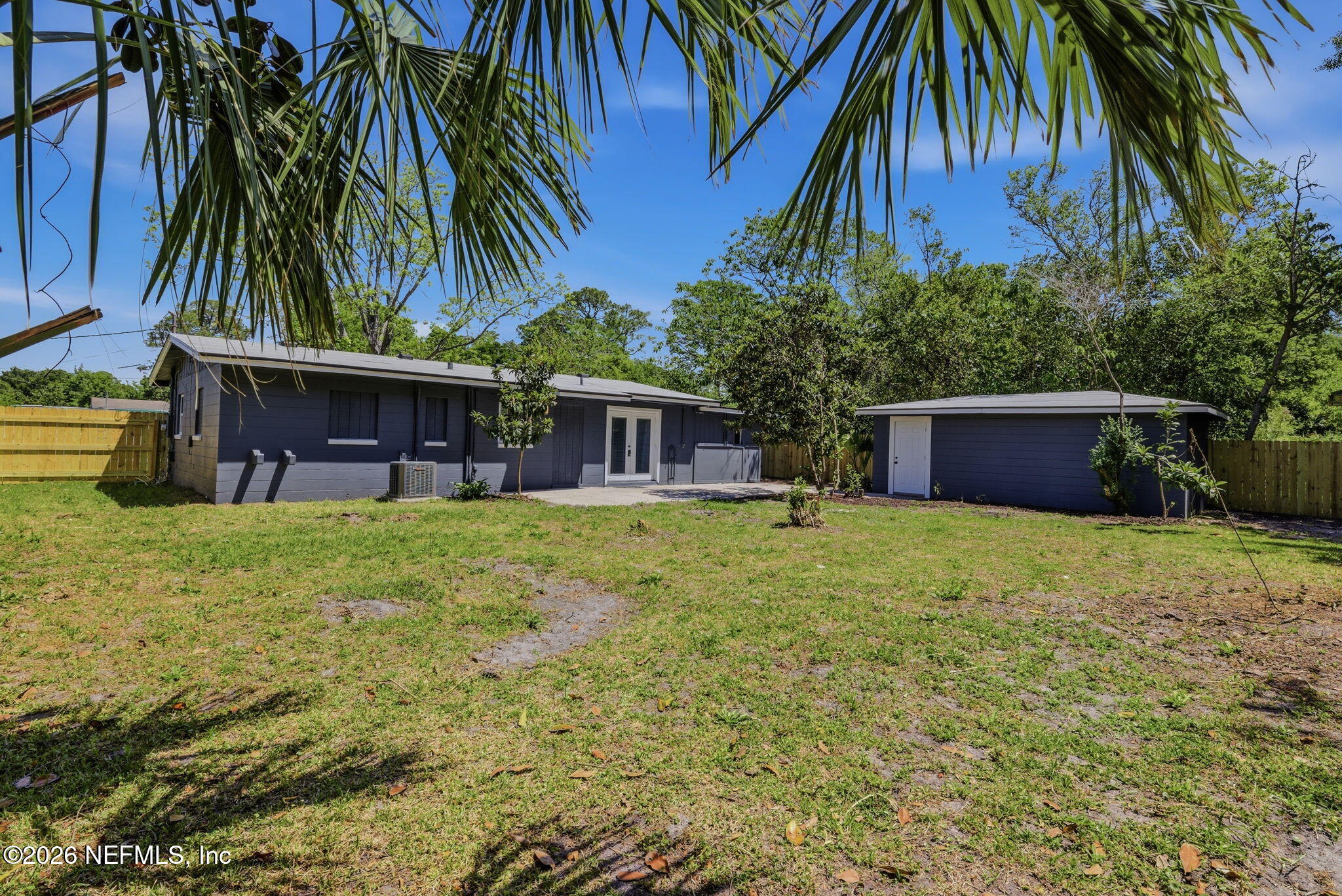 10184 Herndon Road Jacksonville, FL 32246 - Photo 28 of 28 a front view of house with yard and seating area