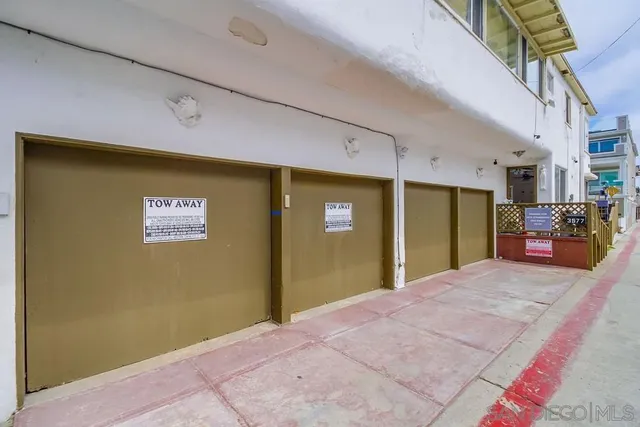 a big room with closet and windows