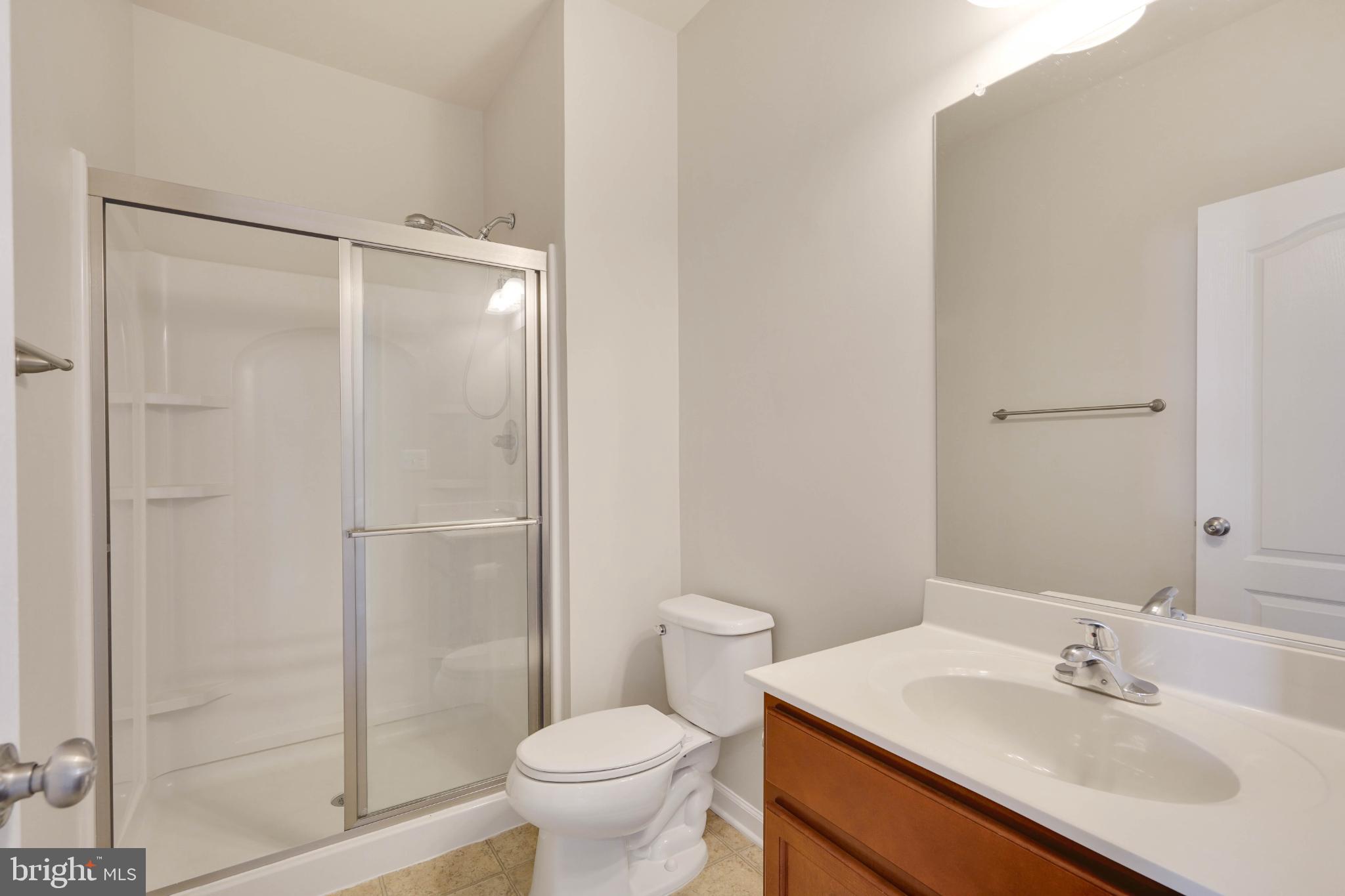 6 Lamplighter Lane Stafford, VA 22554 - Photo 12 of 37 a bathroom with a sink toilet and shower