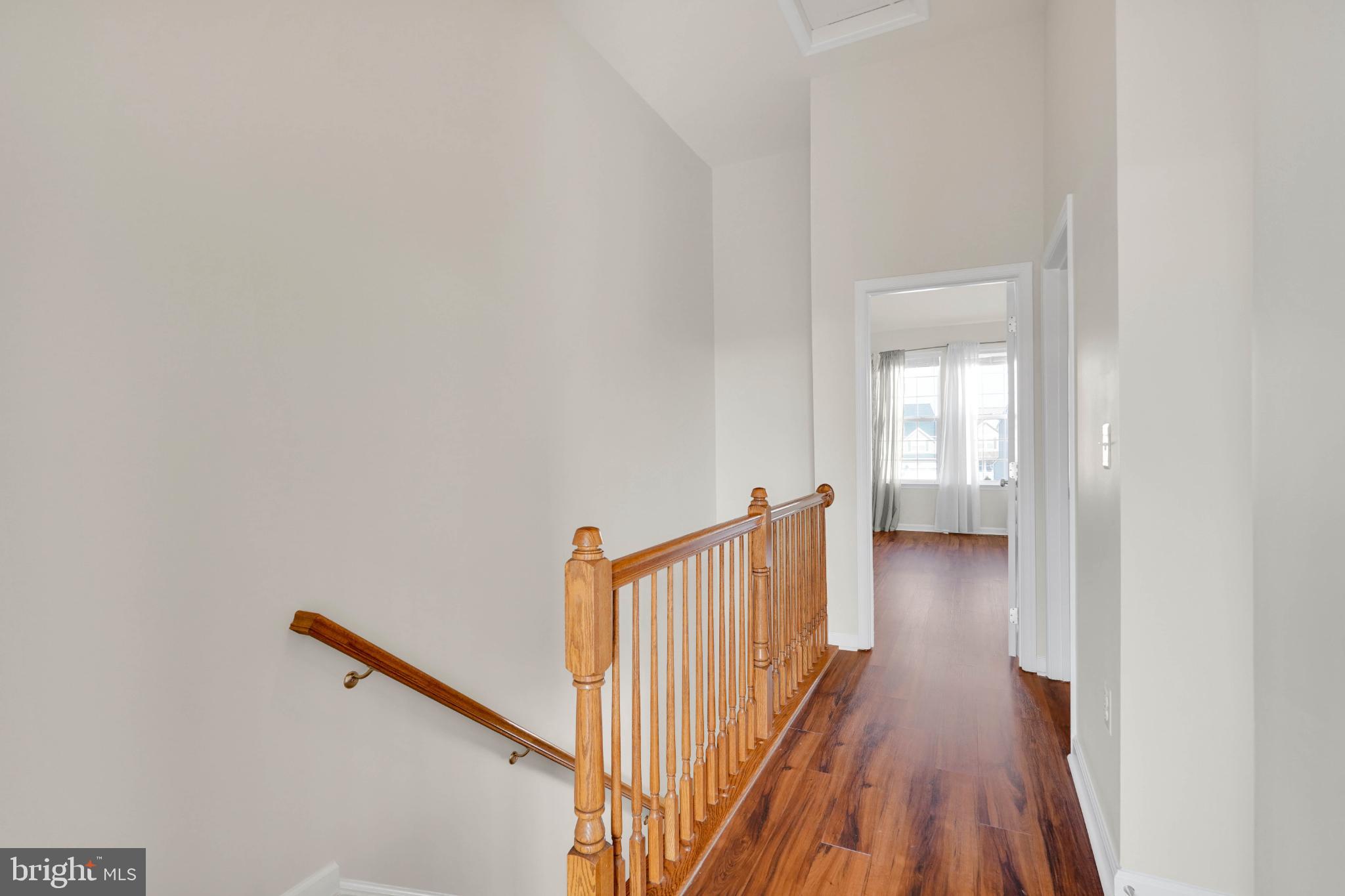 6 Lamplighter Lane Stafford, VA 22554 - Photo 17 of 37 a view of a hallway with wooden floor