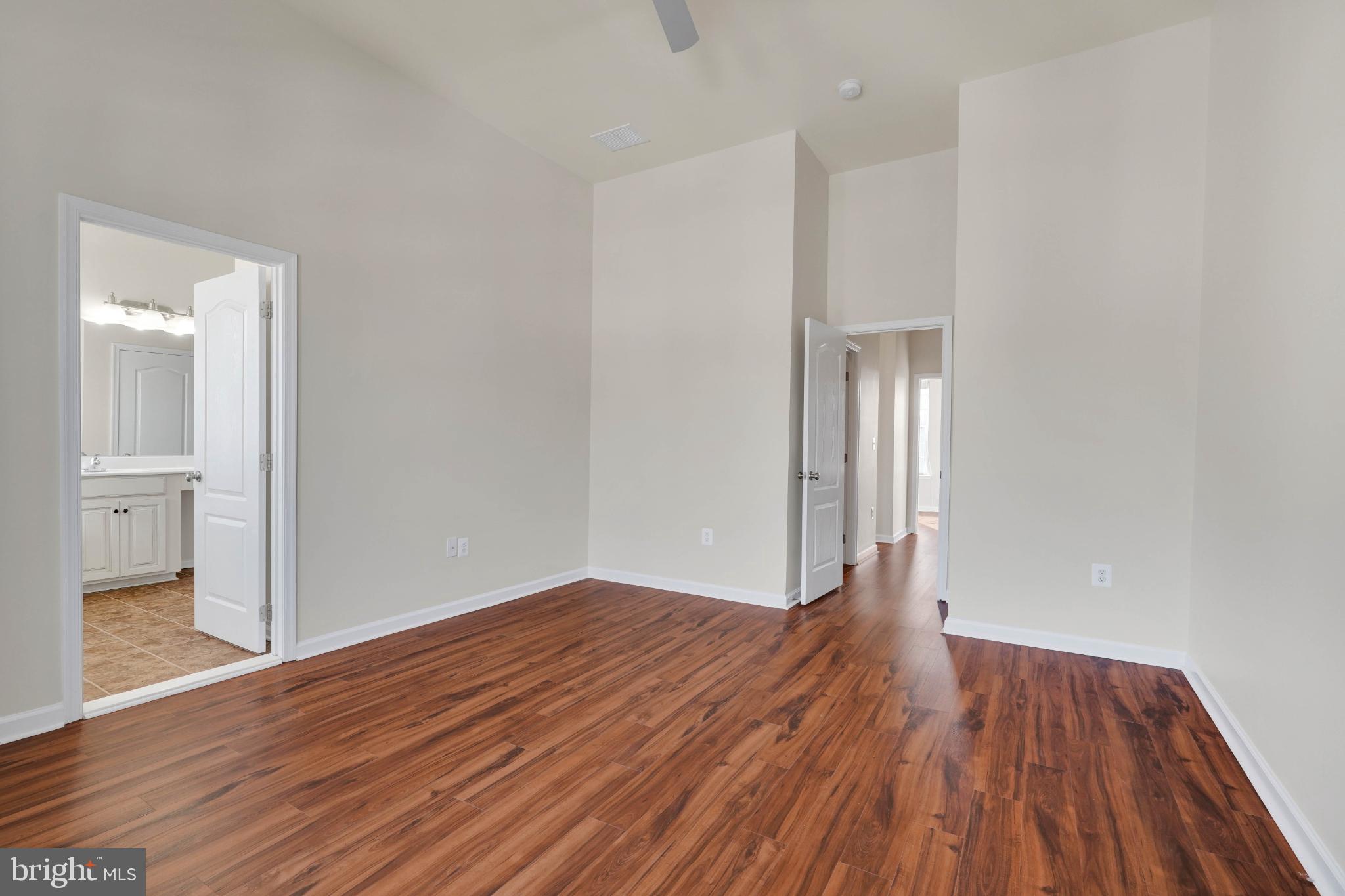 6 Lamplighter Lane Stafford, VA 22554 - Photo 26 of 37 a view of empty room with wooden floor and bathroom