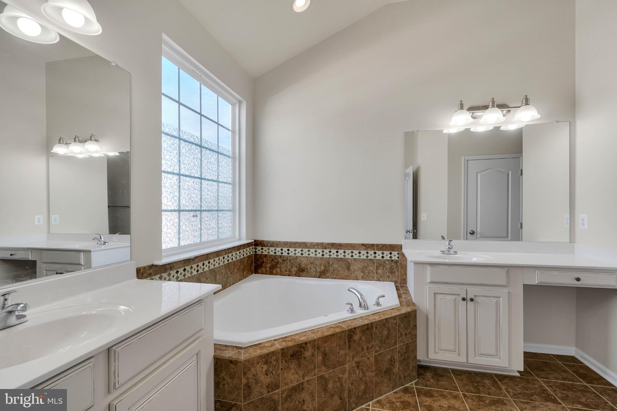 6 Lamplighter Lane Stafford, VA 22554 - Photo 28 of 37 a bathroom with a sink and a mirror
