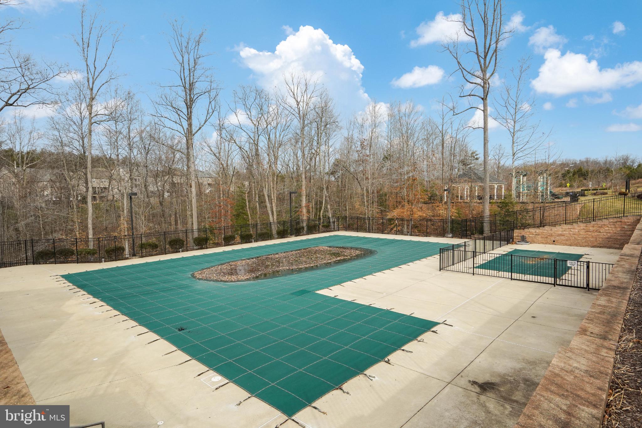 6 Lamplighter Lane Stafford, VA 22554 - Photo 37 of 37 a view of a backyard with swimming pool