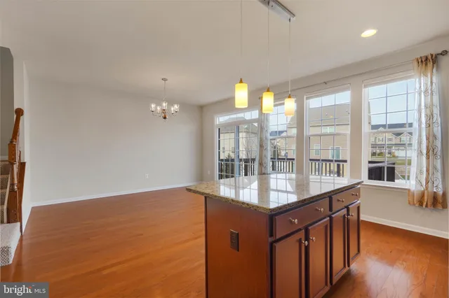 a view of hall with kitchen