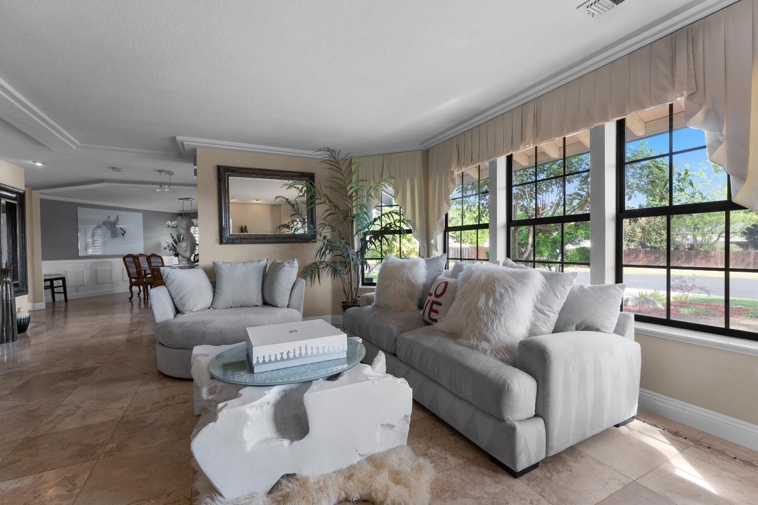 1801 Arroyo Drive Auburn, CA 95603 - Photo 14 of 68 a living room with furniture and a large window