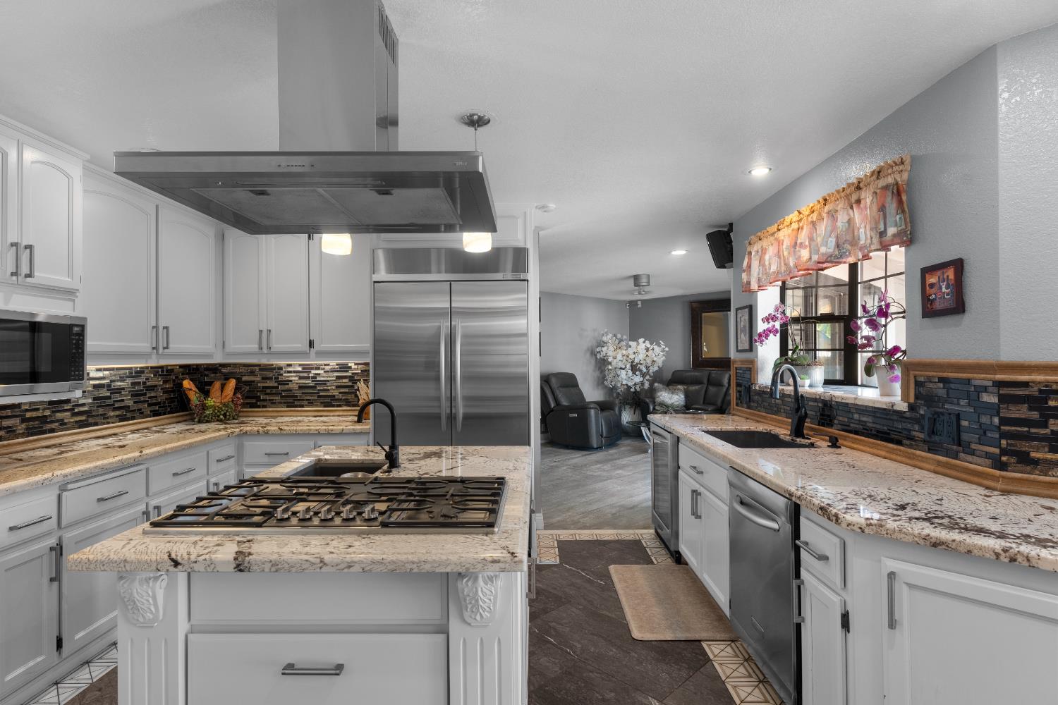 1801 Arroyo Drive Auburn, CA 95603 - Photo 16 of 68 a kitchen with a stove and cabinets
