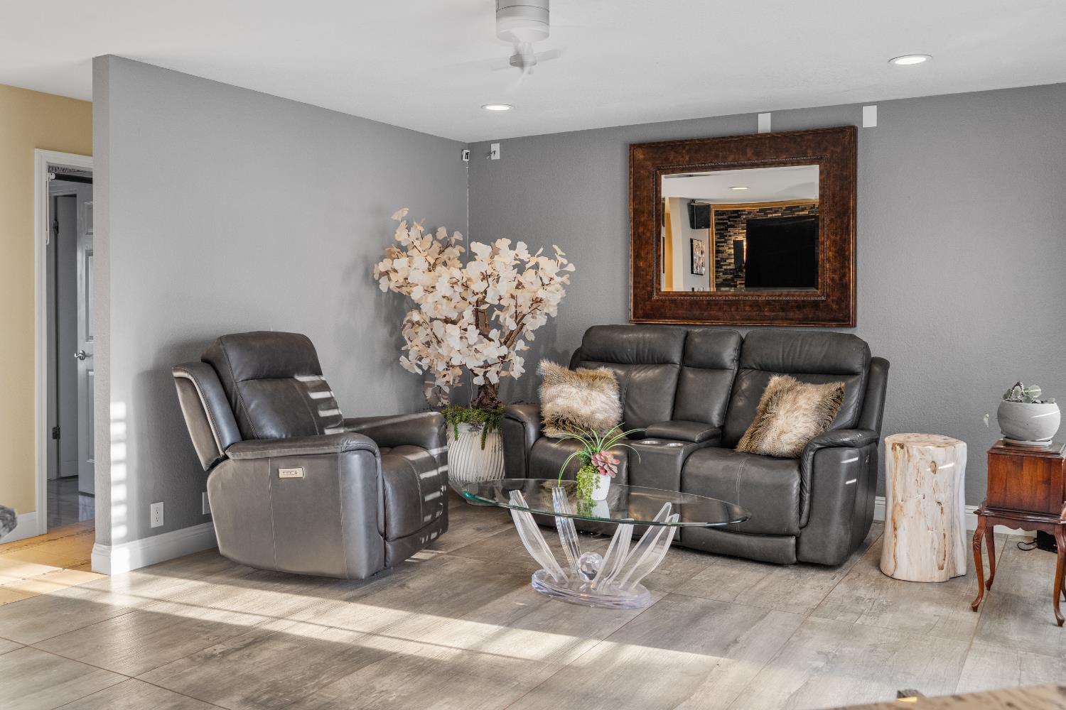 1801 Arroyo Drive Auburn, CA 95603 - Photo 23 of 68 a living room with furniture and a chandelier