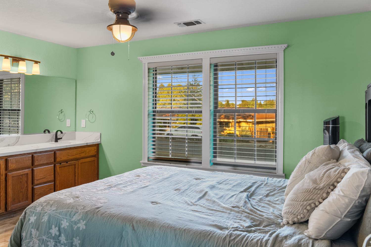 1801 Arroyo Drive Auburn, CA 95603 - Photo 32 of 68 a bedroom with a bed and a large window