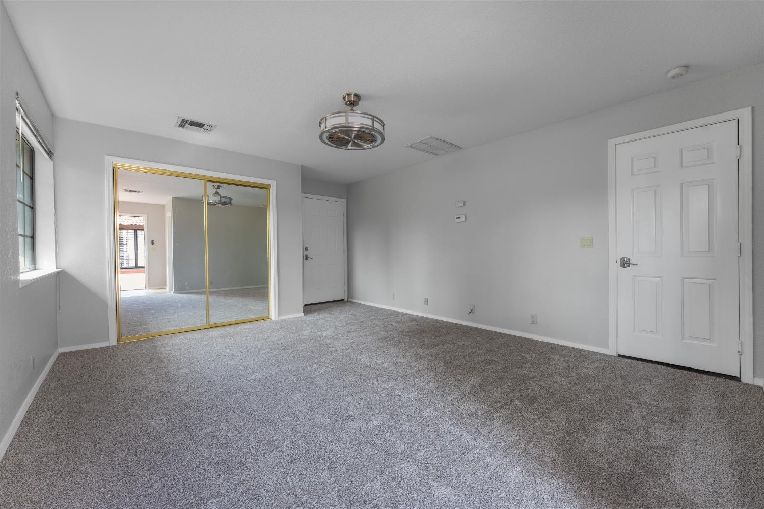 1801 Arroyo Drive Auburn, CA 95603 - Photo 44 of 68 a view of an empty room and a window