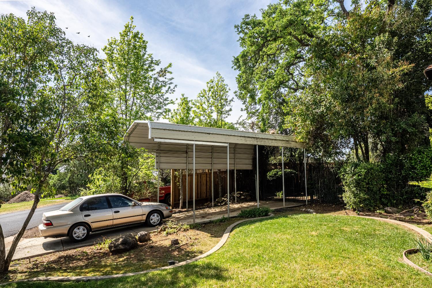 1801 Arroyo Drive Auburn, CA 95603 - Photo 47 of 68 a view of a house with backyard space and sitting area