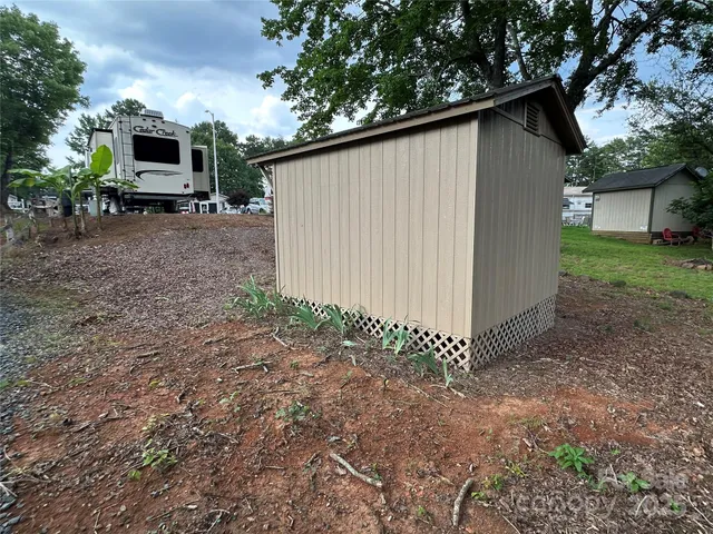 a view of a back yard of the house