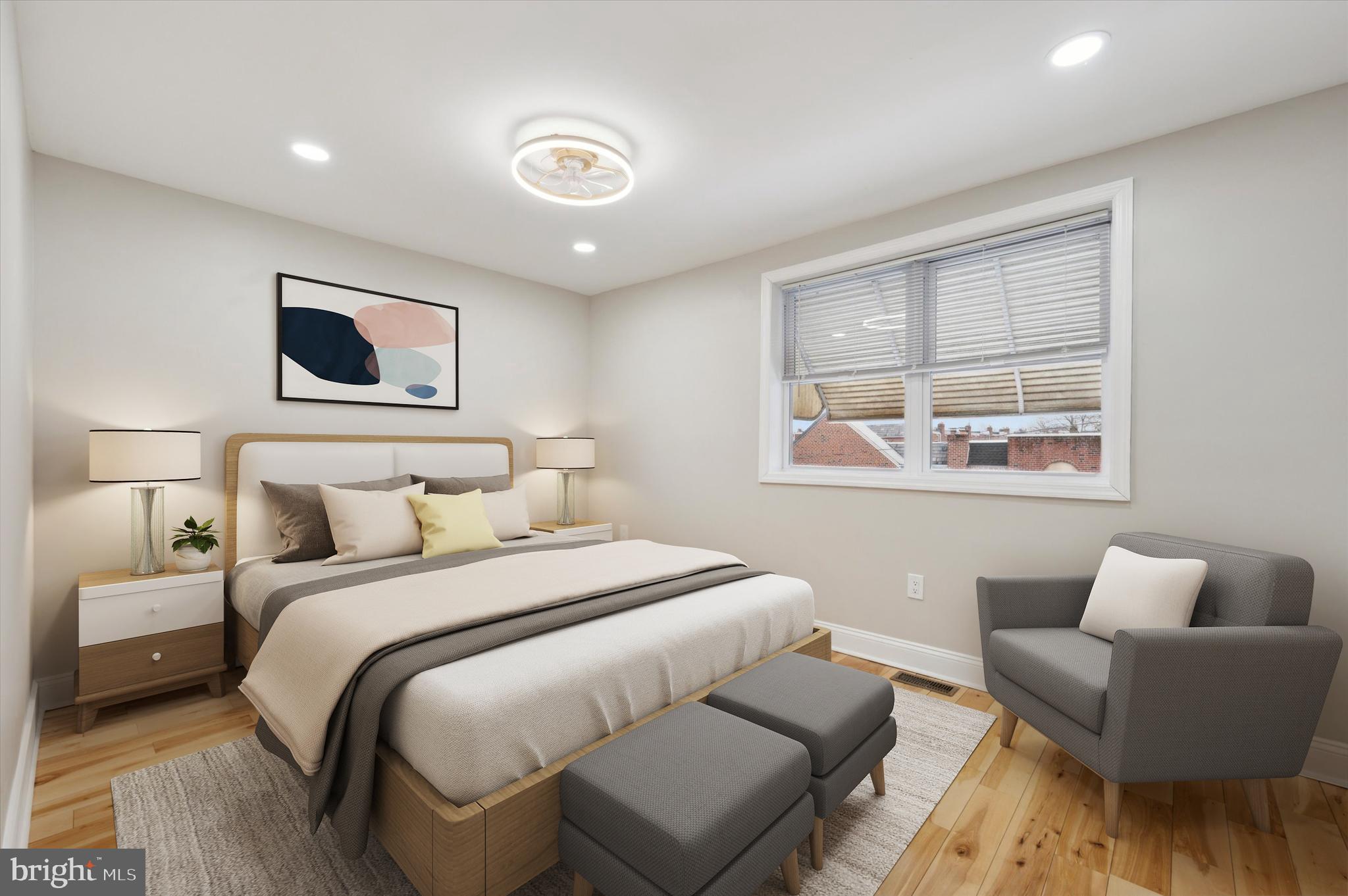 7533 Wheeler Street Philadelphia, PA 19153 - Photo 33 of 50 a bedroom with a bed and a couch