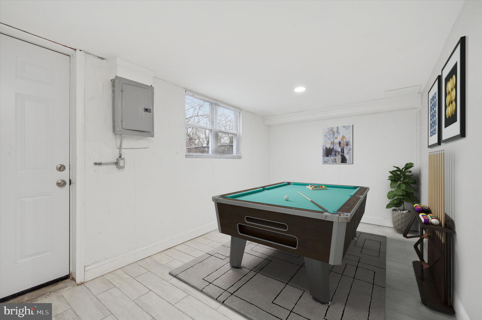 7533 Wheeler Street Philadelphia, PA 19153 - Photo 37 of 50 a room with furniture and a window