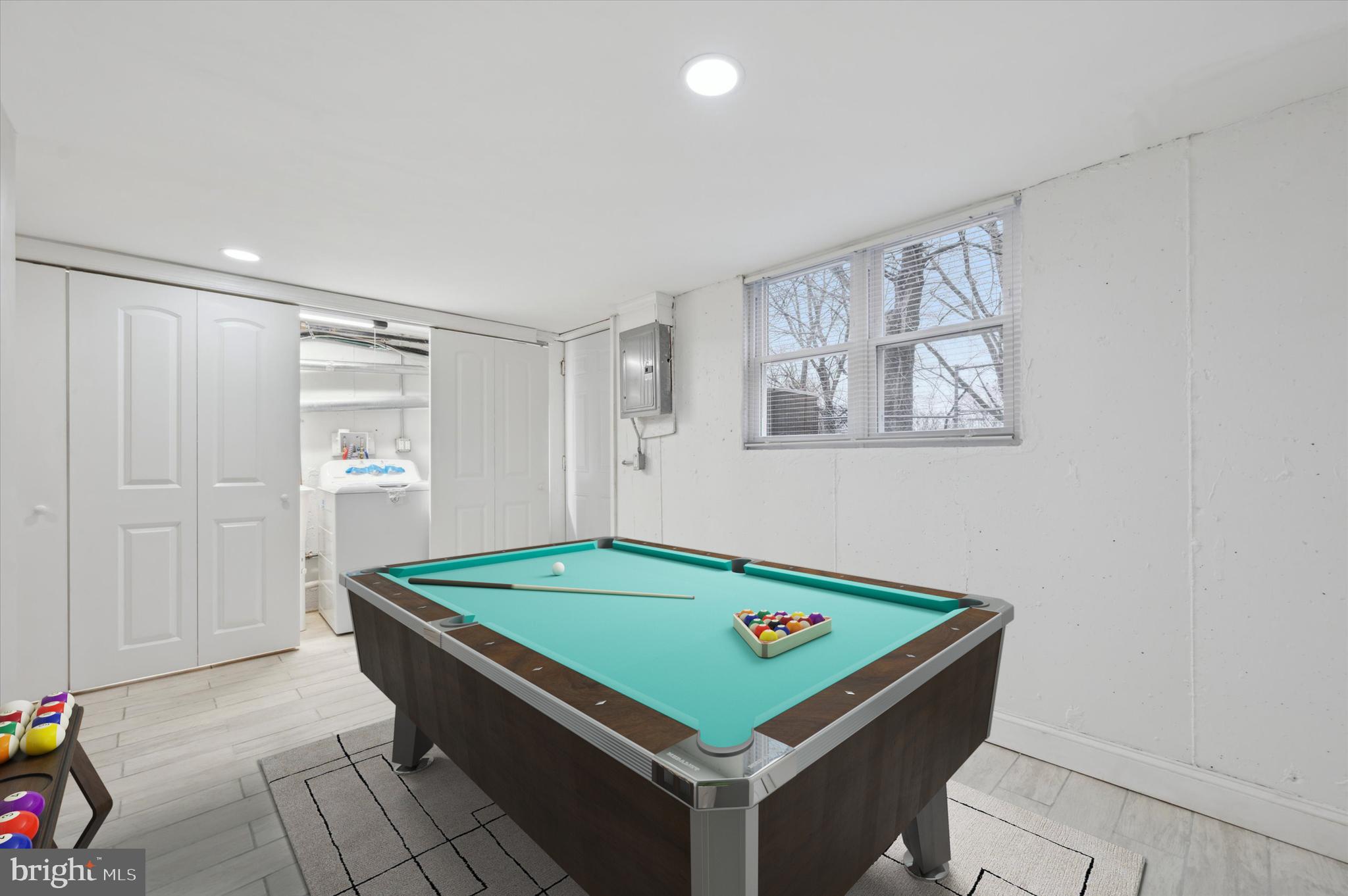 7533 Wheeler Street Philadelphia, PA 19153 - Photo 39 of 50 a room with pool table and windows
