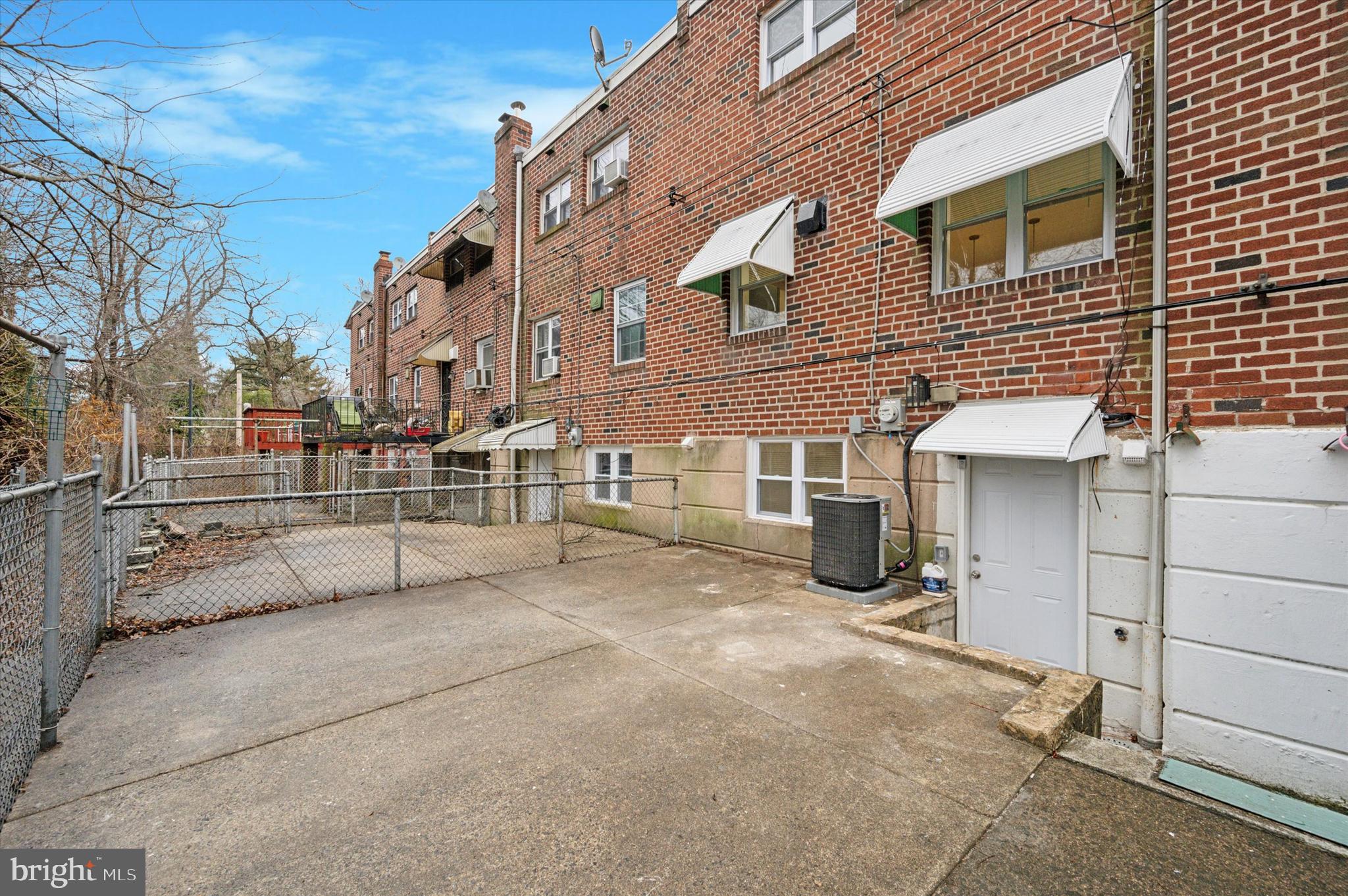 7533 Wheeler Street Philadelphia, PA 19153 - Photo 49 of 50 a view of a house with a parking space in front of it