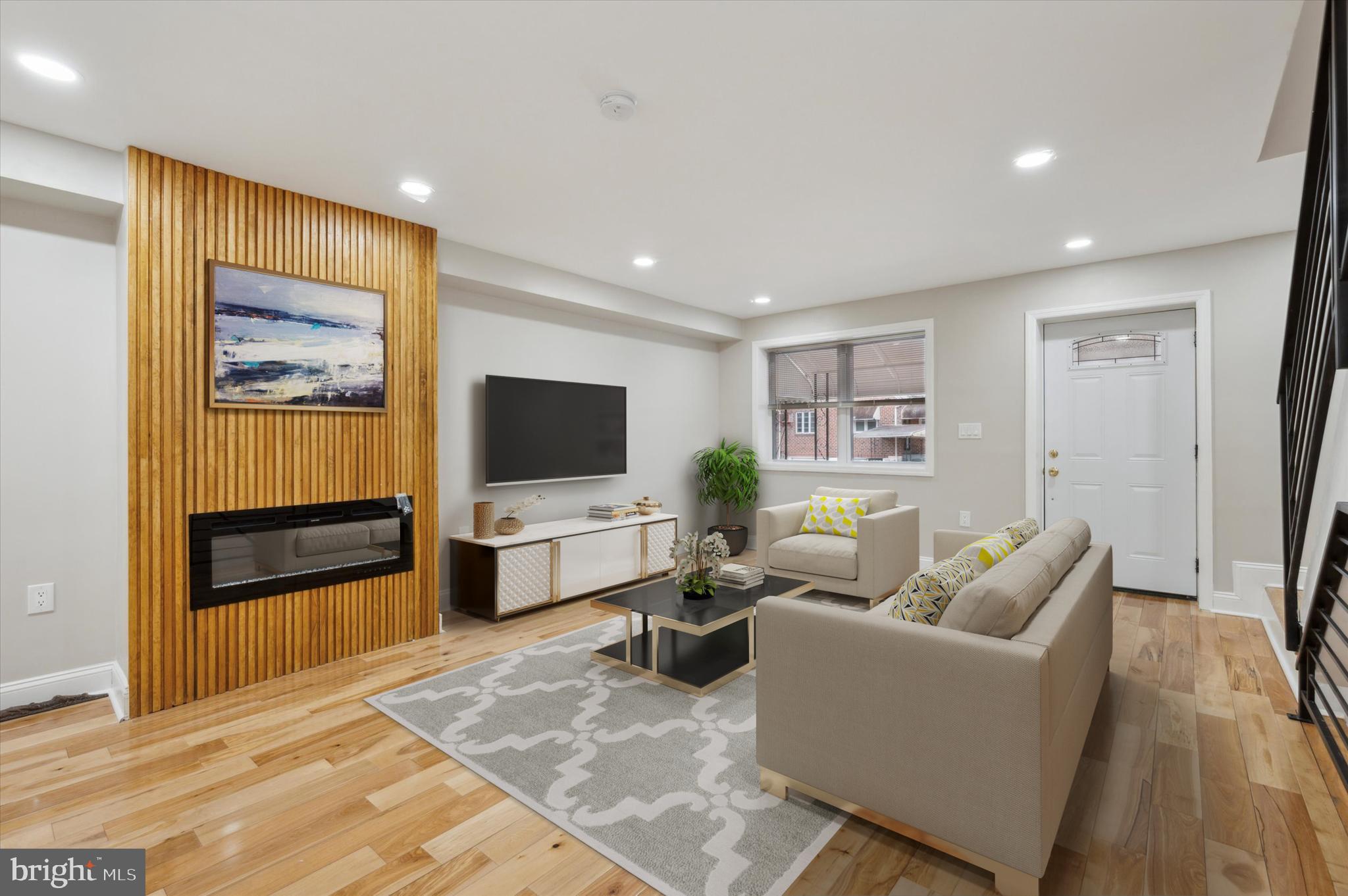 7533 Wheeler Street Philadelphia, PA 19153 - Photo 8 of 50 a living room with furniture and a flat screen tv