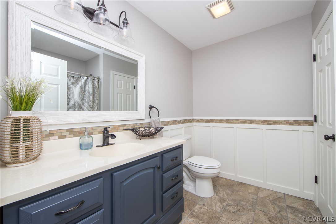 1934 Bumpass Road Bumpass, VA 23024 - Photo 30 of 43 Renovated hall bathroom. Ceramic tile floor, ston