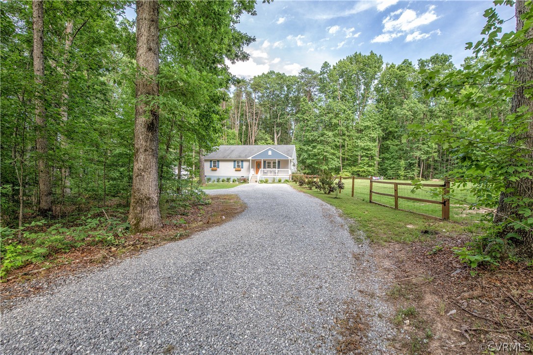 1934 Bumpass Road Bumpass, VA 23024 - Photo 5 of 43 Winding driveway leads you to this awesome house.