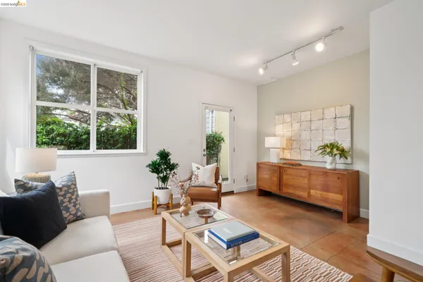 a view of a bathroom sink and windows