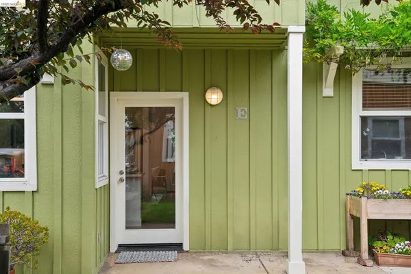 a kitchen with stainless steel appliances a refrigerator and a stove