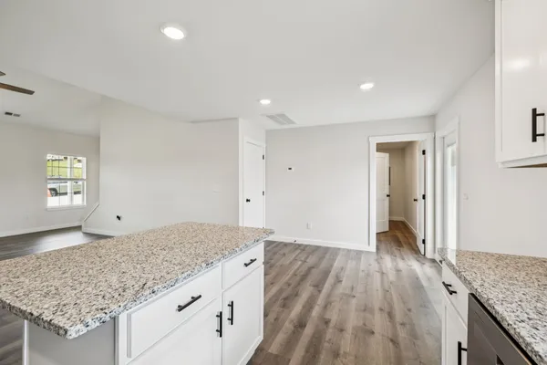 a bathroom with a double vanity sink and mirror
