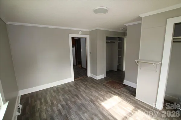 a view of entryway with wooden floor