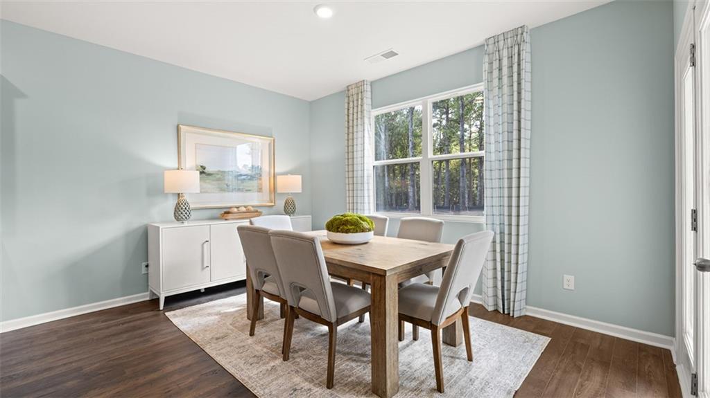 365 Bullock Pass Jefferson, GA 30549 - Photo 13 of 67 a dining room with furniture and wooden floor