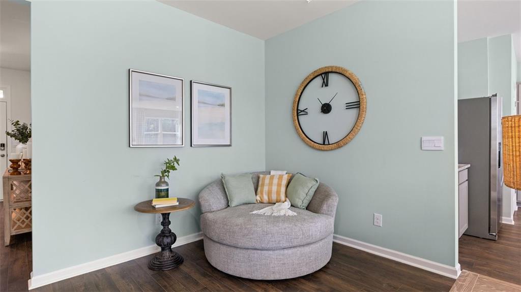 365 Bullock Pass Jefferson, GA 30549 - Photo 16 of 67 a living room with furniture and a wooden floor