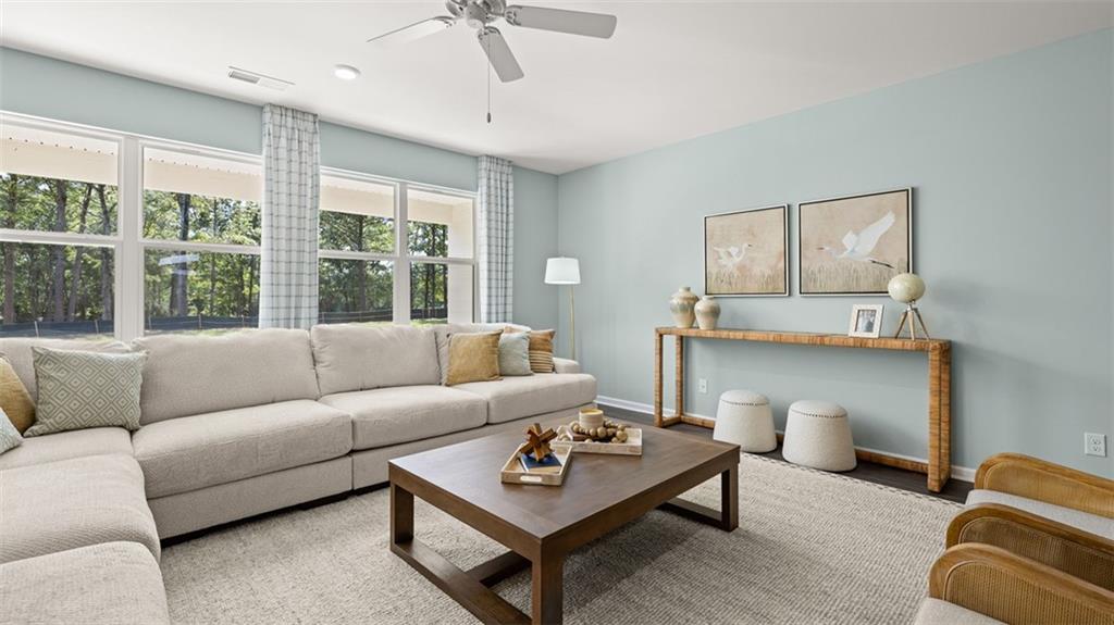 365 Bullock Pass Jefferson, GA 30549 - Photo 18 of 67 a living room with furniture and a large window
