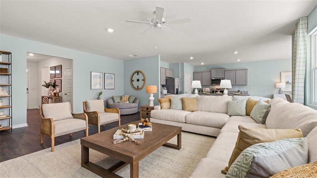 365 Bullock Pass Jefferson, GA 30549 - Photo 19 of 67 a living room with furniture kitchen view and a table