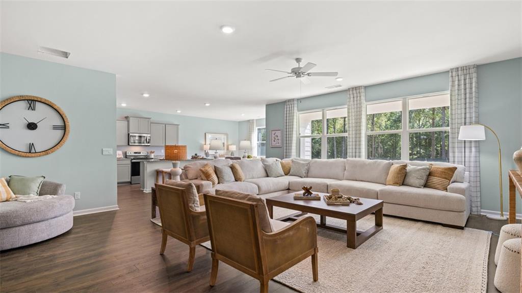 365 Bullock Pass Jefferson, GA 30549 - Photo 20 of 67 a living room with furniture kitchen view and a large window