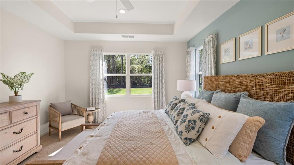 365 Bullock Pass Jefferson, GA 30549 - Photo 25 of 67 a bed room with a bed and a couch