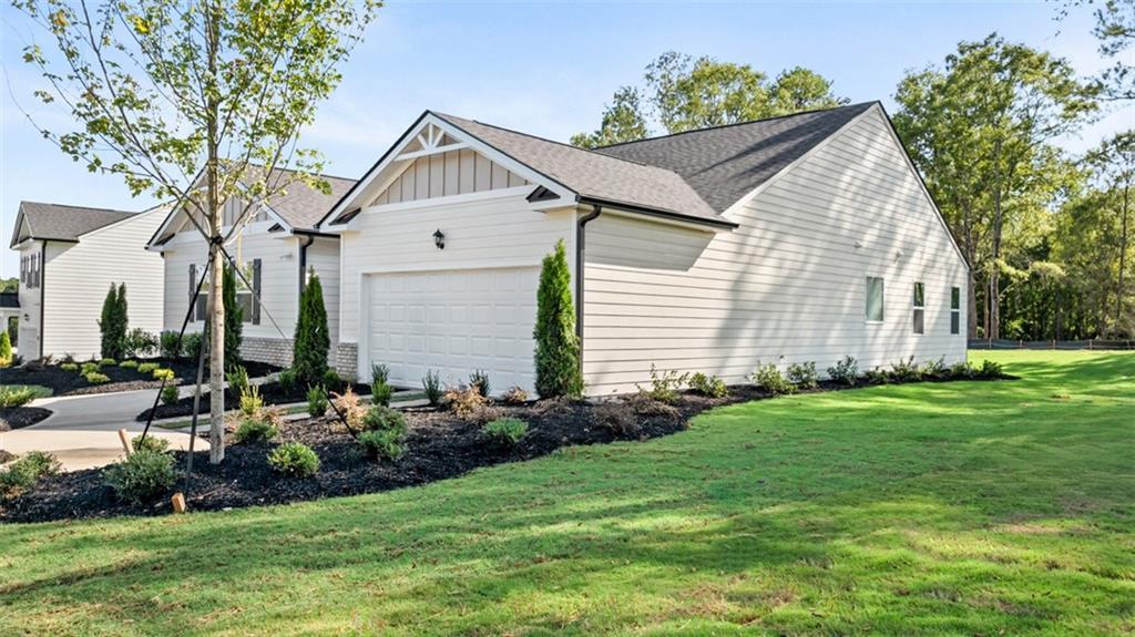 365 Bullock Pass Jefferson, GA 30549 - Photo 3 of 67 a front view of house with yard and green space
