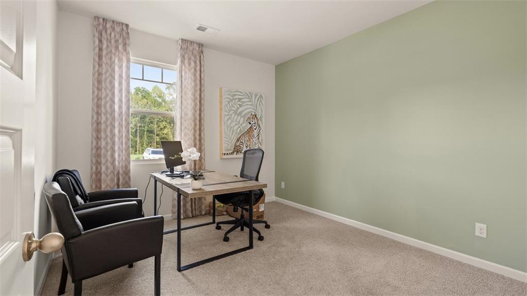 365 Bullock Pass Jefferson, GA 30549 - Photo 36 of 67 a view of a workspace with furniture and a window