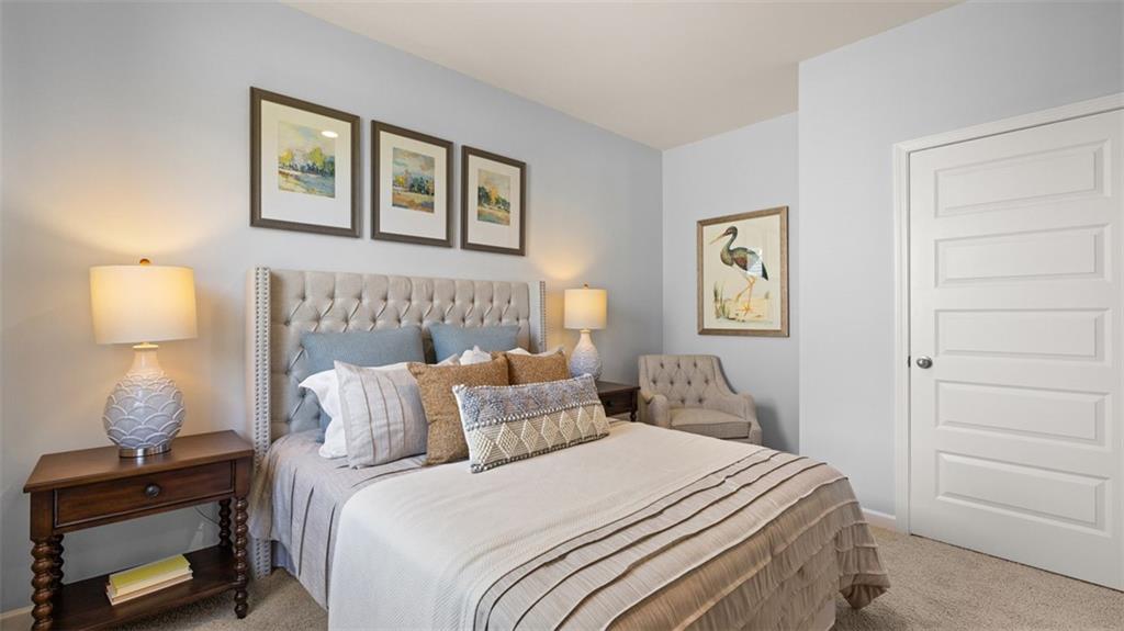 365 Bullock Pass Jefferson, GA 30549 - Photo 39 of 67 a bedroom with a bed and a night stand