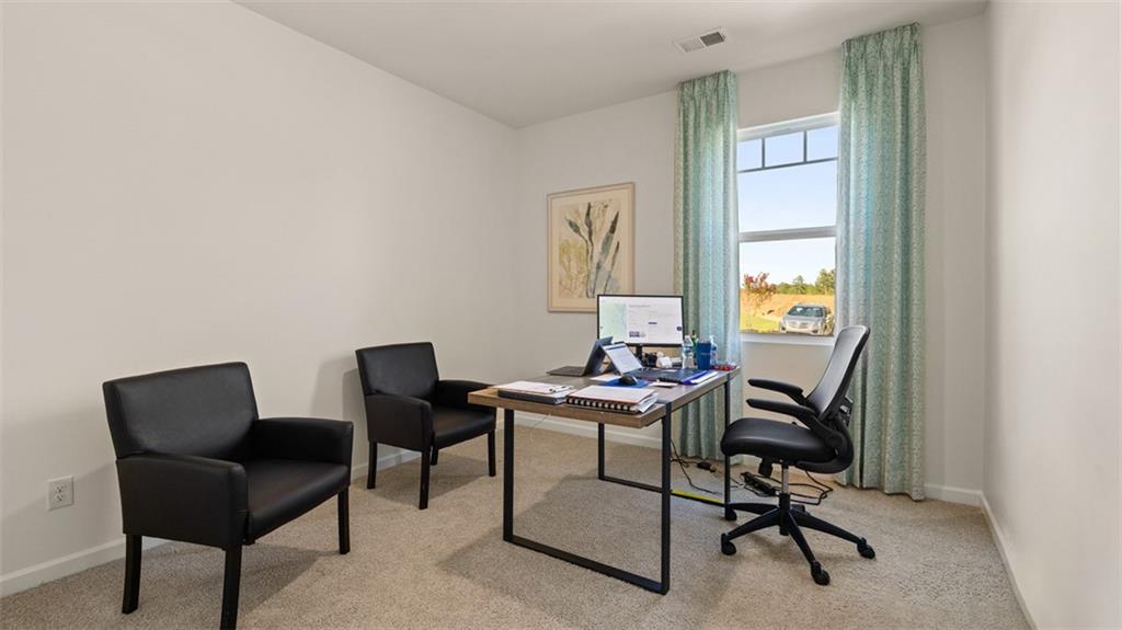 365 Bullock Pass Jefferson, GA 30549 - Photo 41 of 67 a view of a workspace with furniture and a window