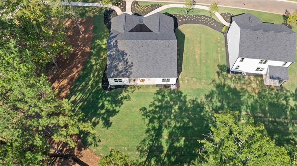 365 Bullock Pass Jefferson, GA 30549 - Photo 50 of 67 an aerial view of a house with swimming pool and large trees