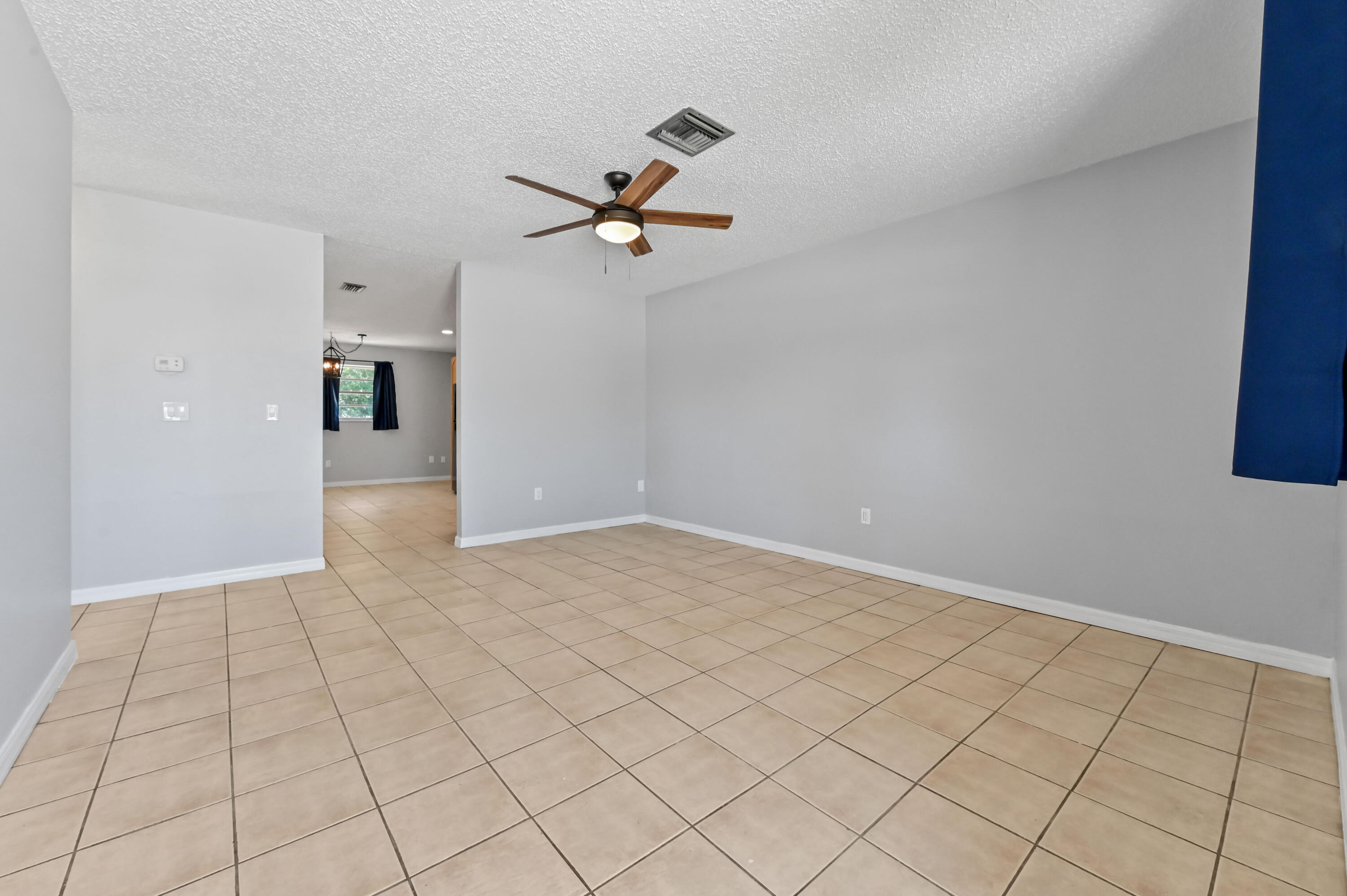 4548-4550 Southeast Salvatori Road Stuart, FL 34997 - Photo 29 of 41 02 Living room 01