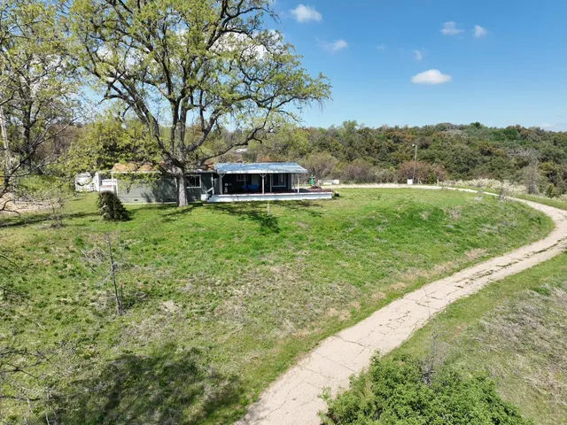 a bedroom with a workspace