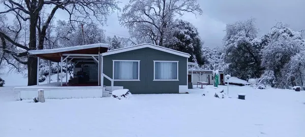 a view of a livingroom with furniture and wooden floor