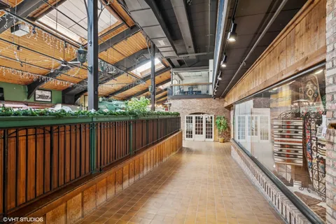 a view of a swimming pool with a bench