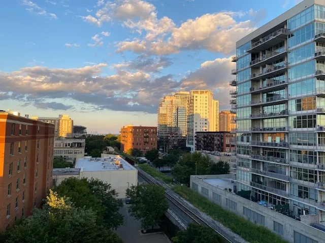 a city view with tall buildings