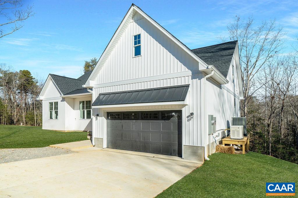 Lot 5 Frays Mill Road Ruckersville, VA 22968 - Photo 2 of 54 a front view of a house with a garden and yard