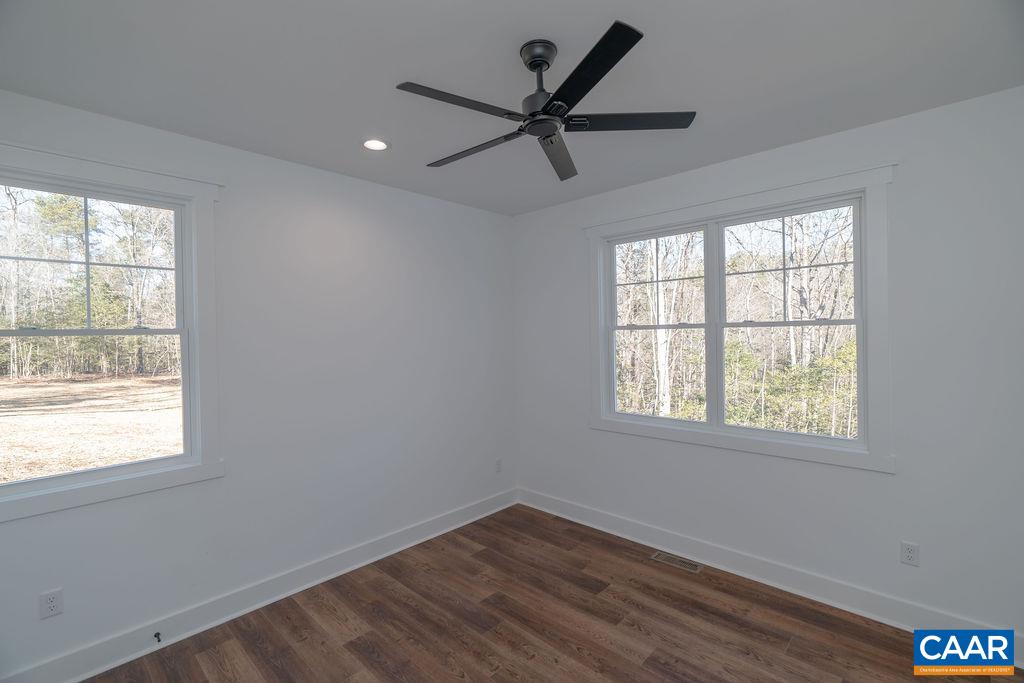 Lot 5 Frays Mill Road Ruckersville, VA 22968 - Photo 31 of 54 a view of a big room with wooden floor and windows