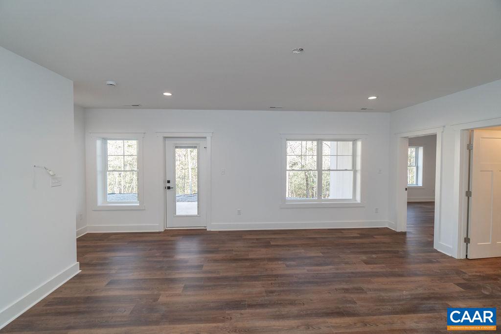 Lot 5 Frays Mill Road Ruckersville, VA 22968 - Photo 37 of 54 a view of an empty room with wooden floor and window