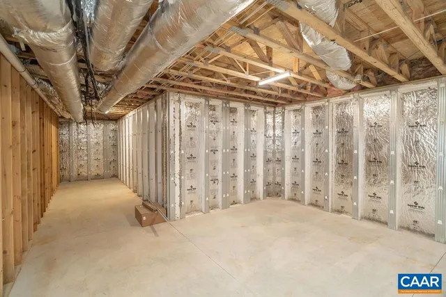 a view of a room with wooden walls