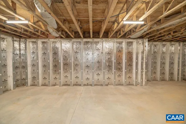 a view of a room with wooden walls