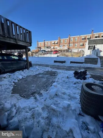 a cars parked in front of a building