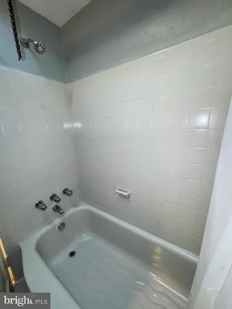 a bathroom with a bathtub